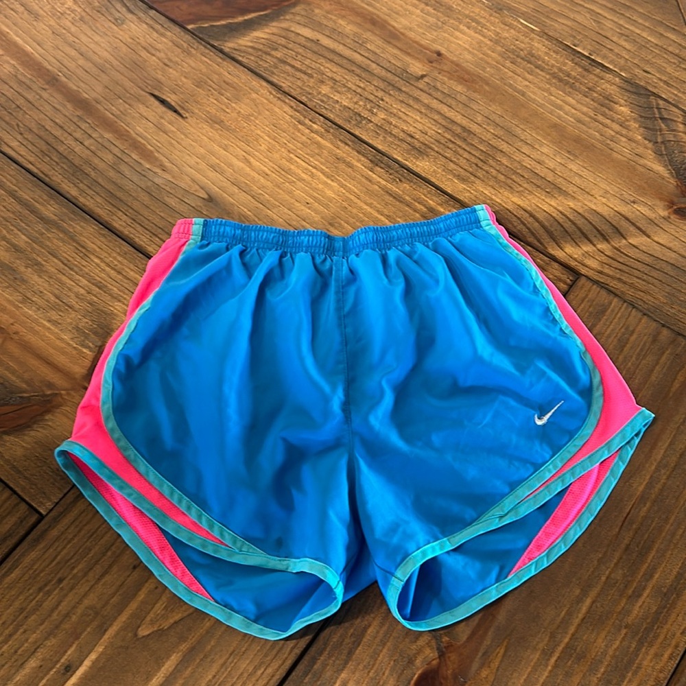 Small blue Nike running shorts